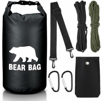 Bear bag kit with dry bag, straps, ropes, carabiners, and pouch.