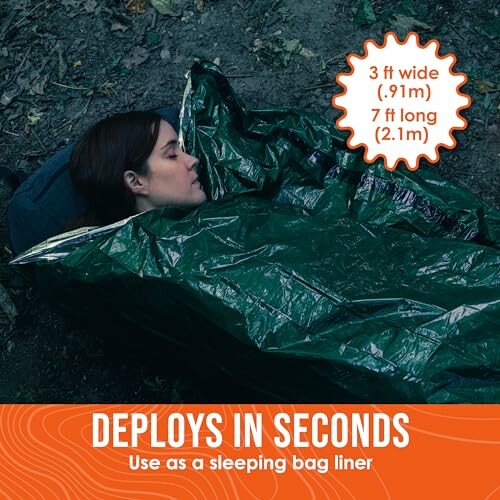 Person in a green emergency sleeping bag liner with dimensions and features displayed.