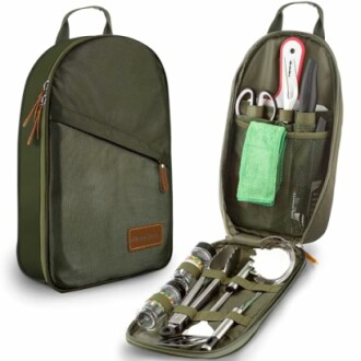 Portable camping kitchen utensil set with various tools in a green carrying case.